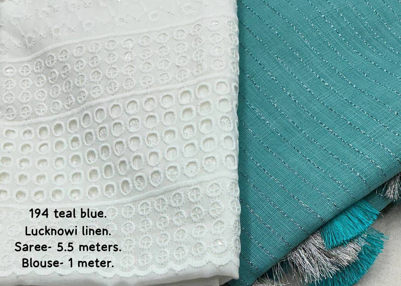 soft linen saree with allover silver zari woven linings.