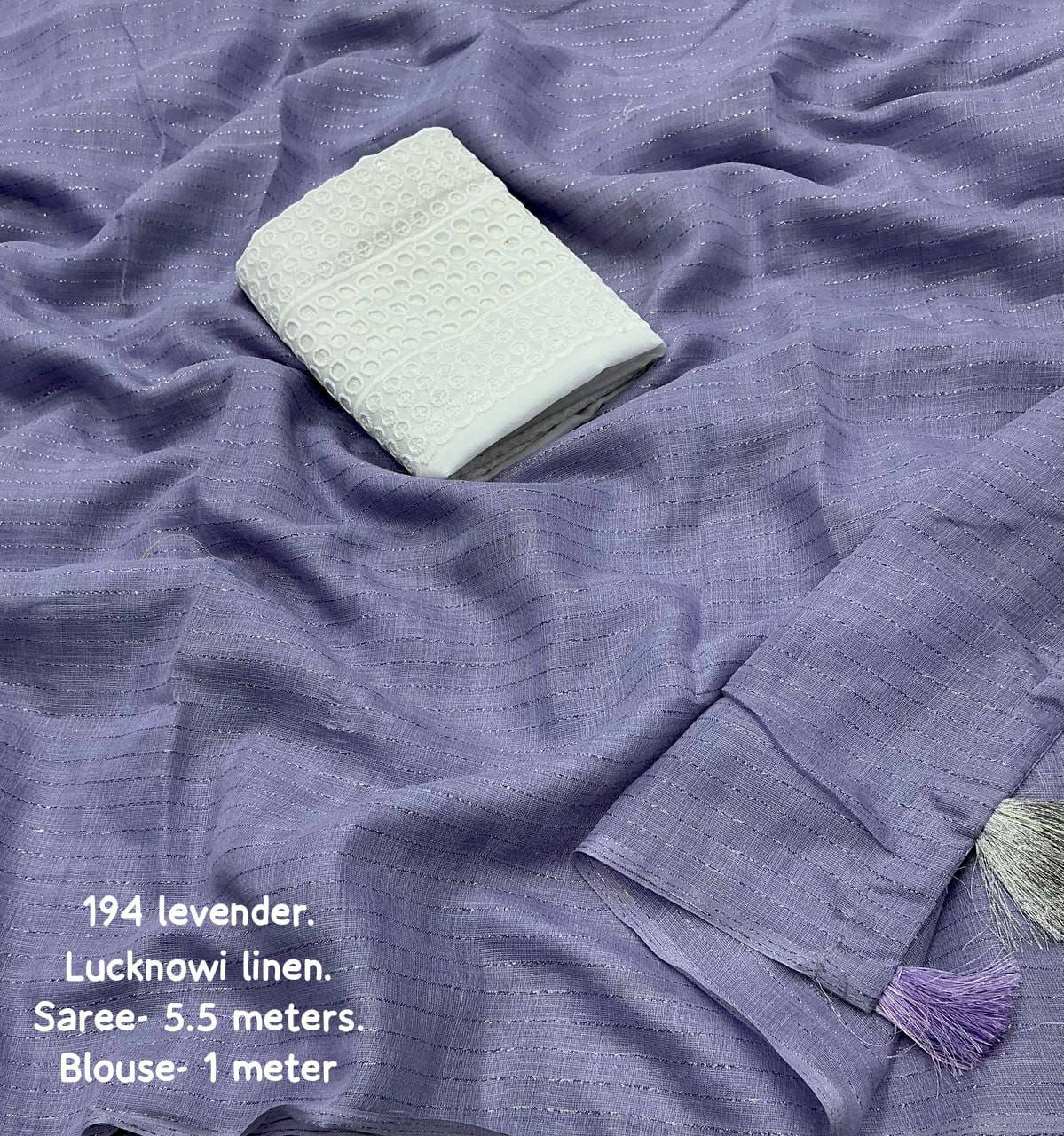 soft linen saree with allover silver zari woven linings.