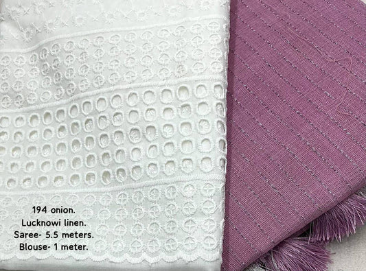 soft linen saree with allover silver zari woven linings.