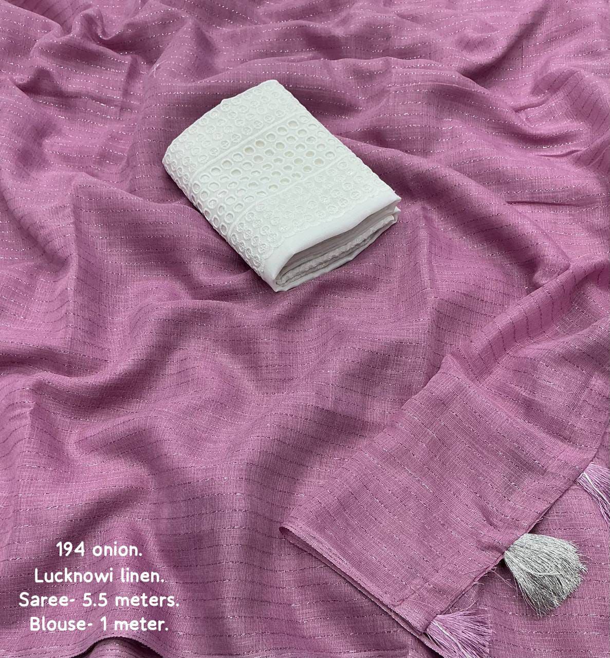 soft linen saree with allover silver zari woven linings.