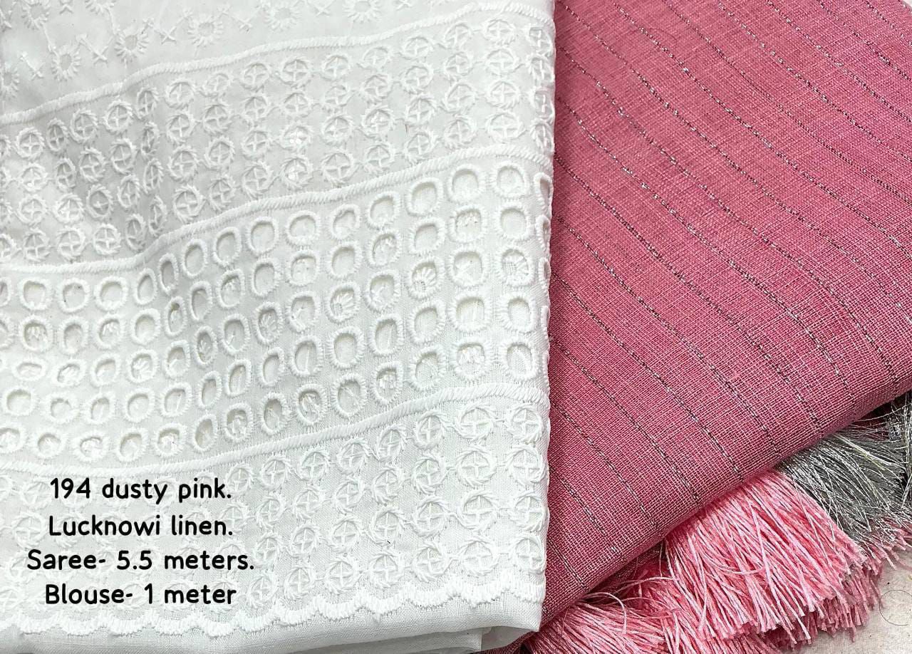 soft linen saree with allover silver zari woven linings.