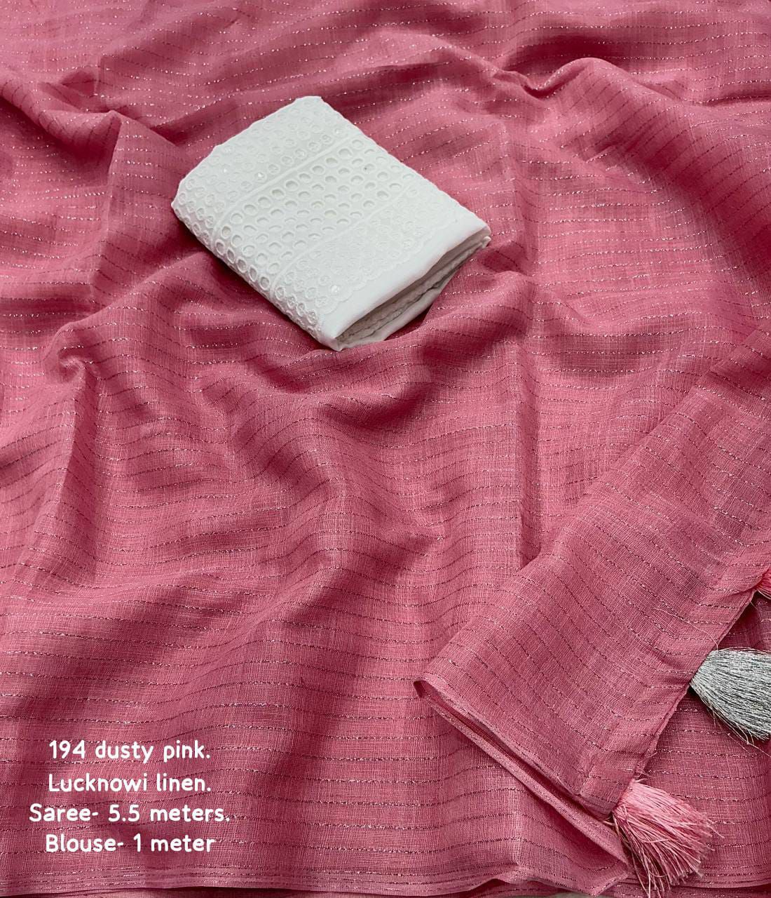 soft linen saree with allover silver zari woven linings.