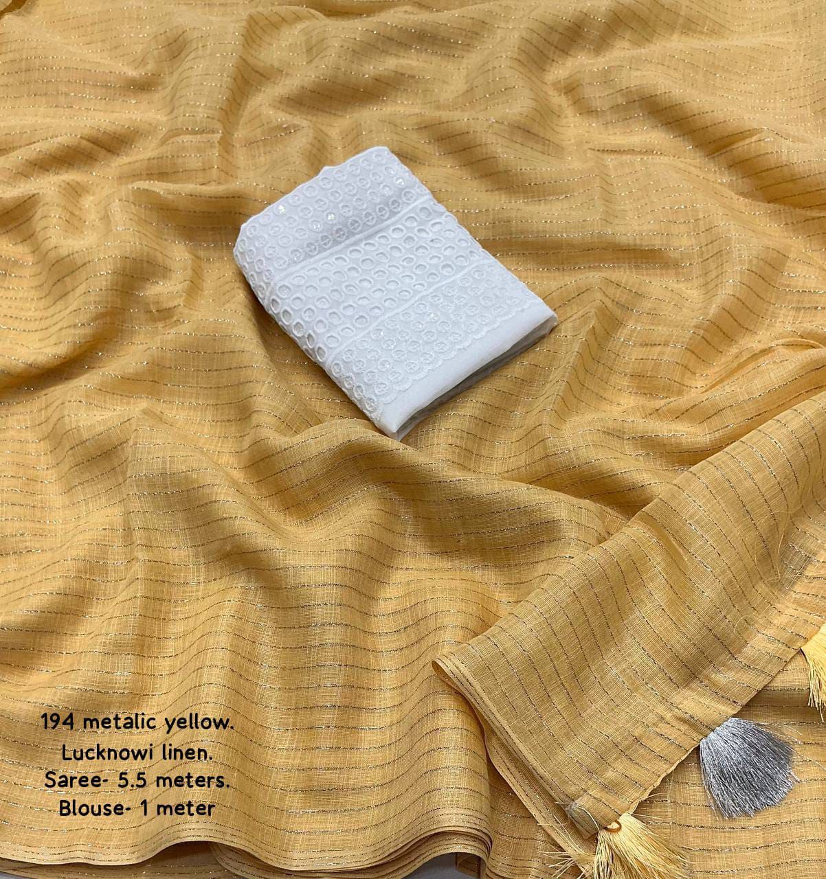 soft linen saree with allover silver zari woven linings.